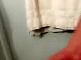 Jerking cock in bathroom