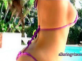 Justene shows off her tits and ass - Alluringvixens