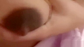 Lactating redhead with dark nipples gives blowjob