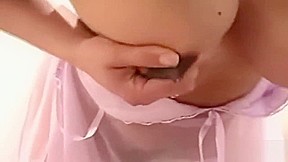Lactating redhead with dark nipples gives blowjob