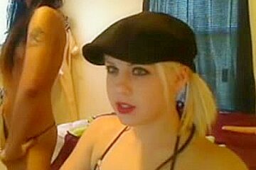 Lesbian lovers fucking with a strapon