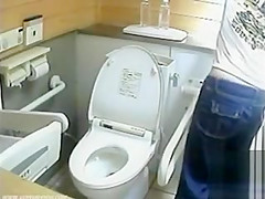 Lovely Japanese girls pee in a public toilet