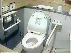 Lovely Japanese girls pee in a public toilet
