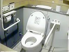 Lovely Japanese girls pee in a public toilet