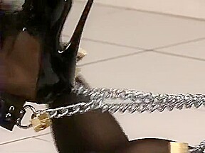 Mary Jane in bolero straitjacket & chains bondage