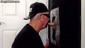 Mature DILF slurping on gloryhole cock till mouth spermed