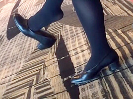 Mature air hostess dangling