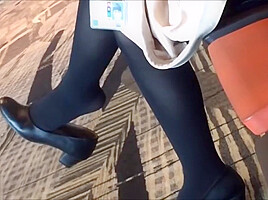 Mature air hostess dangling