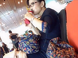 Mature air hostess dangling