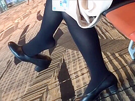 Mature air hostess dangling