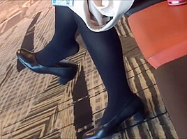 Mature air hostess dangling