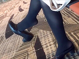 Mature air hostess dangling