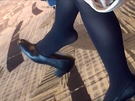 Mature air hostess dangling