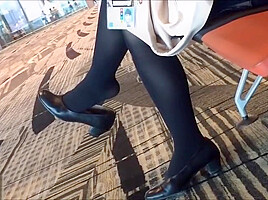 Mature air hostess dangling