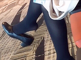 Mature air hostess dangling
