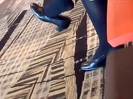 Mature air hostess dangling