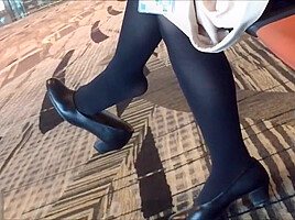 Mature air hostess dangling