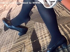 Mature air hostess dangling