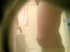Mature and hairy woman in bathroom