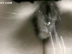 Mature woman pissing in hole