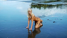 Natali blond beach dark sand