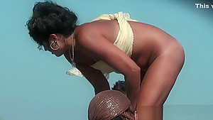 Nudist curly haired brunette with great tits