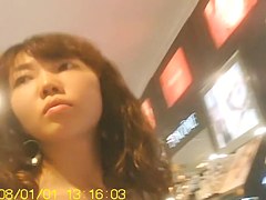 Oriental chick awesome up skirt legs on the camera