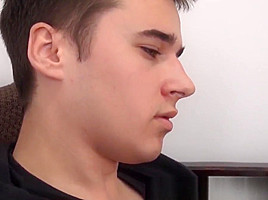 Perverted twink licks his feet and strokes his thick cock