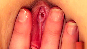 Petite virgin shows hymen in close-up