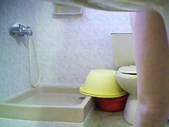 Pissing scenes with slim girl in white top and panty