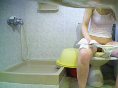 Pissing scenes with slim girl in white top and panty