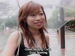 Pretty Asian girl enjoying toy inserting