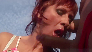 Redhead mature has her holes pounded in the park