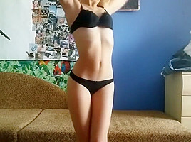 Russian girl poses for the webcam and then Masturbates