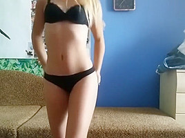 Russian girl poses for the webcam and then Masturbates