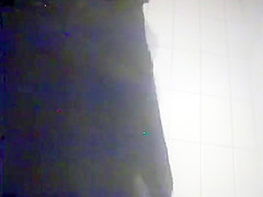 Sensual brunette gets naked before putting on her sexy clot