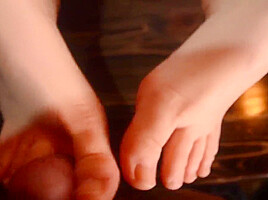 She Caught Friend Jerkin Off And Gives Footjob Under Table