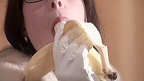 Spex brunette talking dirty while eating banana by Femdom Austria