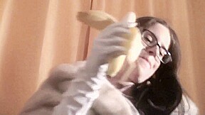 Spex brunette talking dirty while eating banana by Femdom Austria