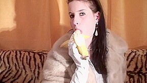 Spex brunette talking dirty while eating banana by Femdom Austria