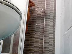 Spying On Sexy Wife Shaving Pussy In Shower