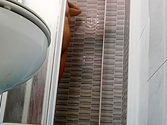 Spying On Sexy Wife Shaving Pussy In Shower