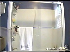 Spying on a breasty roommate as that babe takes shower