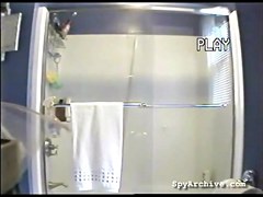 Spying on a breasty roommate as that babe takes shower