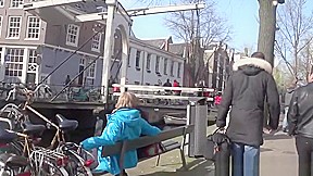 Tattooed dutch hooker riding tourists cock