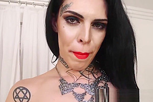 Tattooed tranny Gaby Ink tugging her big swollen cock