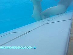 This Lovely Girl Shows Her Big Tits Underwater In The Pool While The Cam Is Watching Her!
