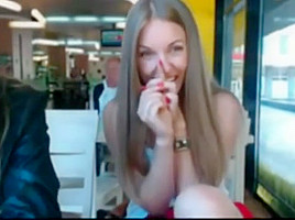 Two Girls taking off their Clothes in Public Cafe while