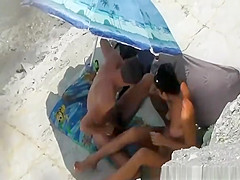 Under the sun umbrella handjob