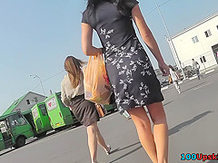 Upskirting cute slim girl in the wonderful sunny day